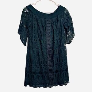 Size M Trixxi Green lace dress with floral and geometric patterns.